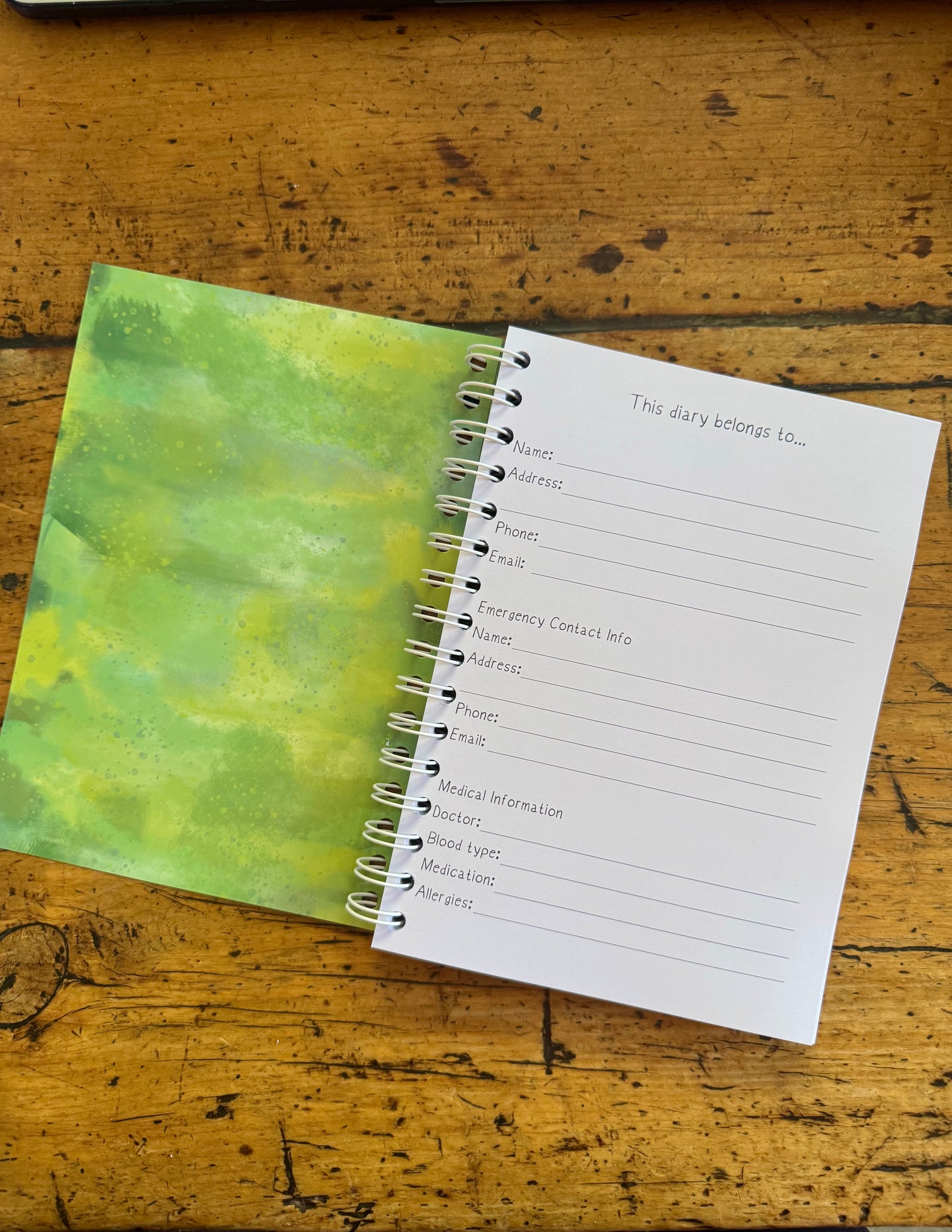 A6 wire bound week to view 2026 diary, featuring lots of characterful illustrations