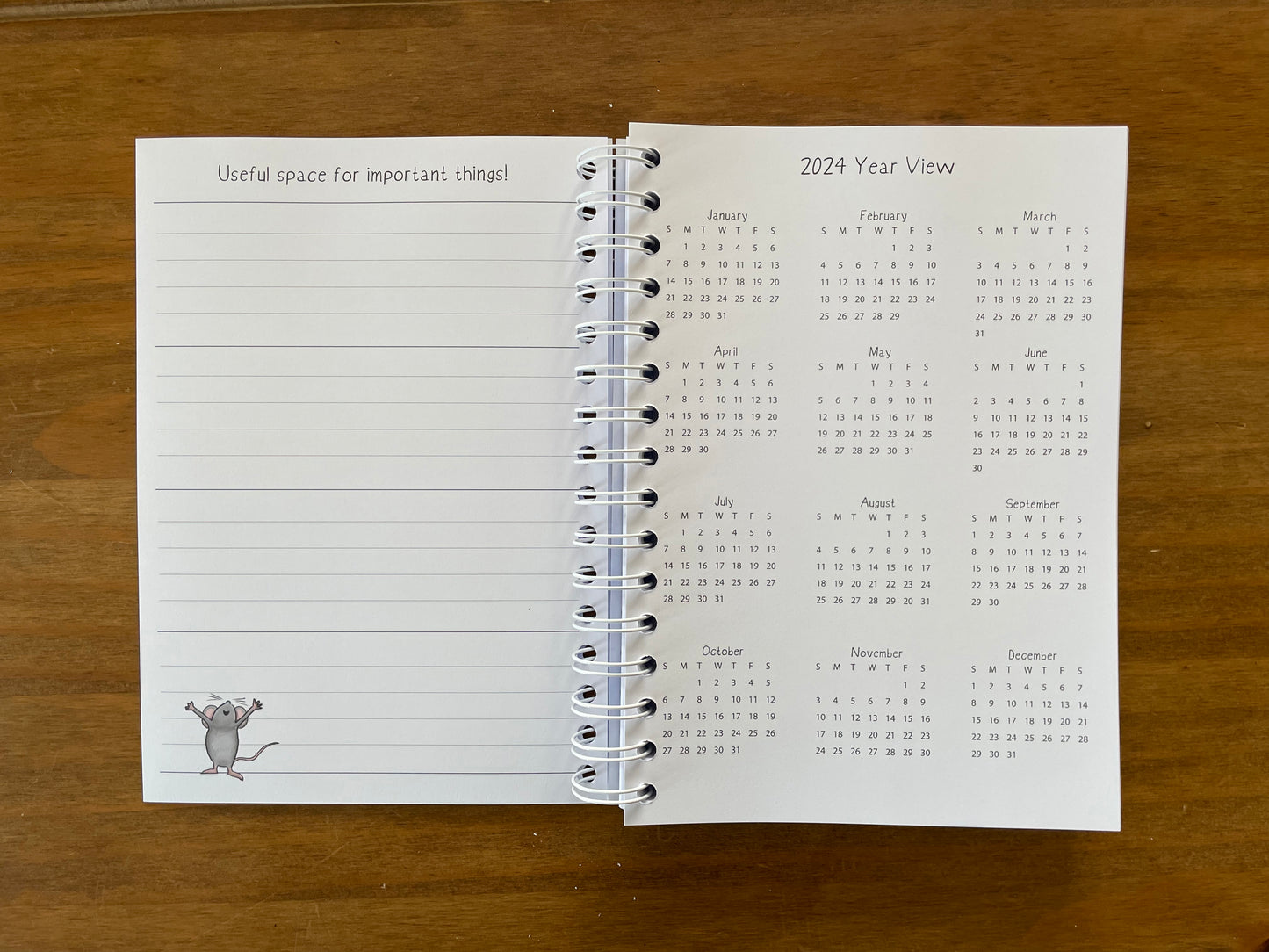 A5 wire bound week to view 2024 diary, featuring lots of characterful illustrations