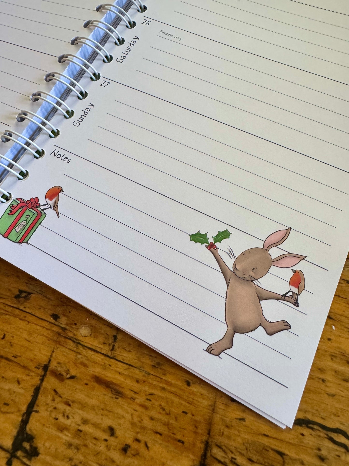 A6 wire bound week to view 2026 diary, featuring lots of characterful illustrations