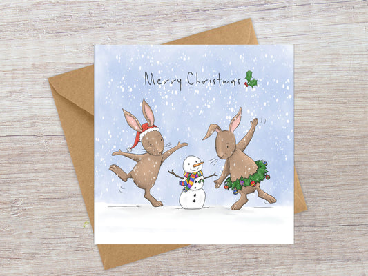 Dancing bunnies and snowman Christmas card
